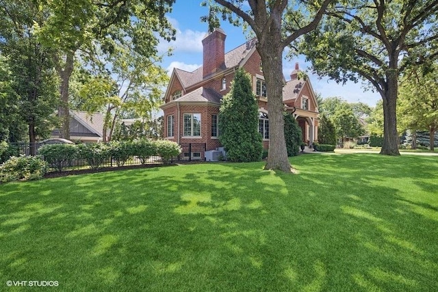 3967 Garden Ave, Western Springs, IL 60558 - rear view of property featuring a chimney and brick siding