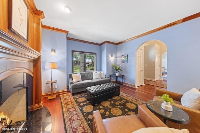 3967 Garden Ave, Western Springs, IL 60558 - living room featuring arched walkways, wood finished floors, and ornamental molding
