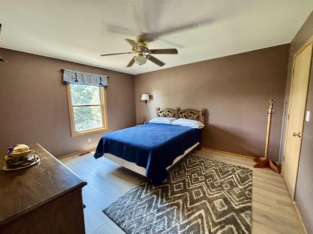 2525 E 6th St, Belvidere, IL 61008 - bedroom with light wood-style flooring and a ceiling fan