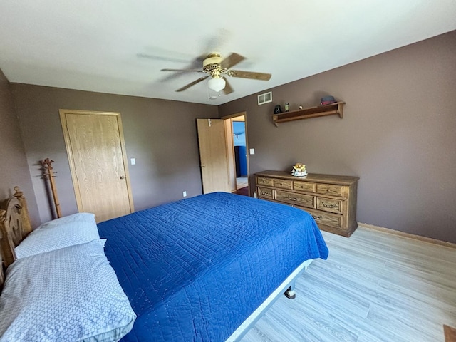 2525 E 6th St, Belvidere, IL 61008 - bedroom with light wood-type flooring and ceiling fan