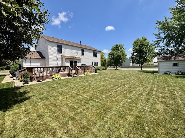 2525 E 6th St, Belvidere, IL 61008 - view of green lawn with a deck