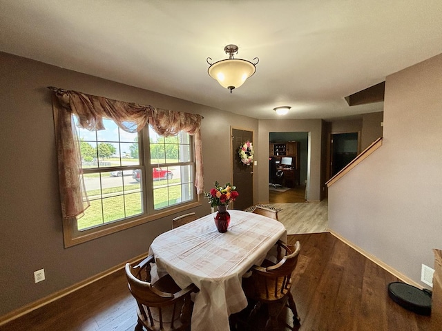 2525 E 6th St, Belvidere, IL 61008 - dining area featuring baseboards and wood finished floors