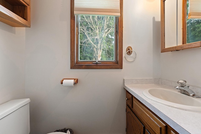 831 Horseshoe Dr Unit B, Joliet, IL 60435 - half bathroom featuring toilet and vanity
