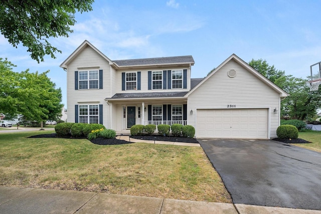 2311 Tremont Ave, Aurora, IL 60502 - traditional home with asphalt driveway, covered porch, a front yard, and an attached garage