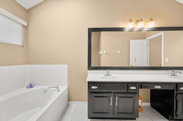 2311 Tremont Ave, Aurora, IL 60502 - bathroom featuring tile patterned floors, double vanity, and a bath