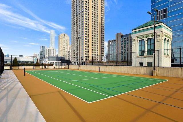 345 N La Salle Dr Unit 1010, Chicago, IL 60654 - view of tennis court with community basketball court and a view of skyline
