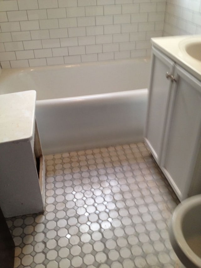 7816 S Indiana Ave, Chicago, IL 60619 - full bathroom featuring vanity and a bath