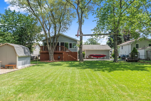 3850 Seaview Dr, Hanover Park, IL 60133 - back of house with a shed, stairway, a yard, and a wooden deck