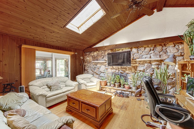 324 E 173rd Pl, South Holland, IL 60473 - living area featuring lofted ceiling, ceiling fan, a skylight, wooden walls, and light wood finished floors