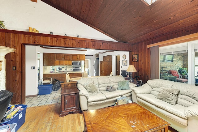 324 E 173rd Pl, South Holland, IL 60473 - living room featuring lofted ceiling, wood walls, light wood finished floors, and wood ceiling
