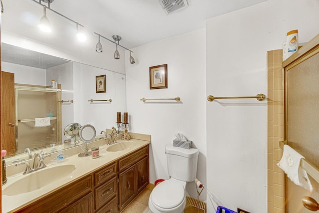 324 E 173rd Pl, South Holland, IL 60473 - bathroom featuring a shower with door, double vanity, and tile patterned flooring