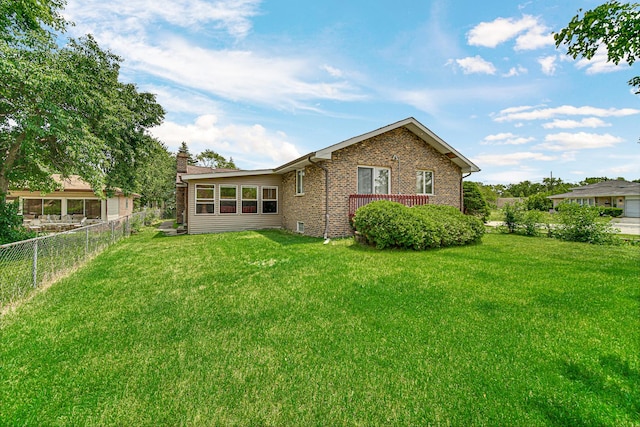 324 E 173rd Pl, South Holland, IL 60473 - back of house featuring brick siding and a chimney