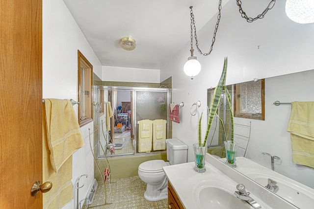 324 E 173rd Pl, South Holland, IL 60473 - full bath with vanity, enclosed tub / shower combo, and tile patterned floors