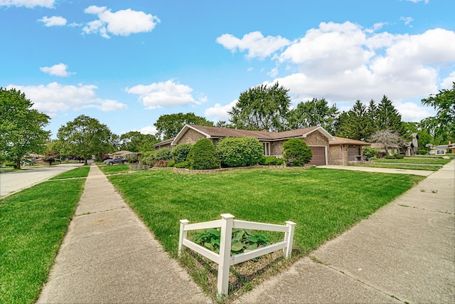 324 E 173rd Pl, South Holland, IL 60473 - view of front facade with driveway, a front lawn, an attached garage, and brick siding