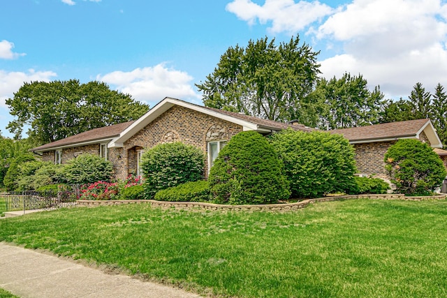 324 E 173rd Pl, South Holland, IL 60473 - single story home featuring brick siding and a front yard