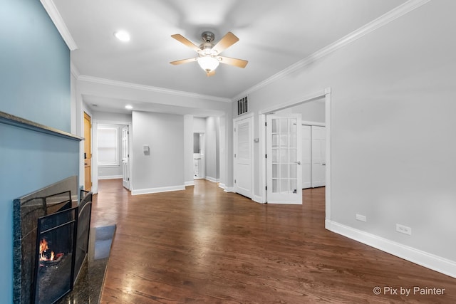 5323 S Harper Ave S Unit 1, Chicago, IL 60615 - unfurnished living room featuring a ceiling fan, crown molding, wood finished floors, a warm lit fireplace, and recessed lighting