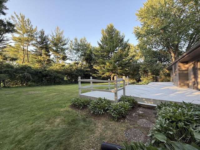 6412 Redbird Ln, Crystal Lake, IL 60012 - view of green lawn with a wooden deck and view of scattered trees