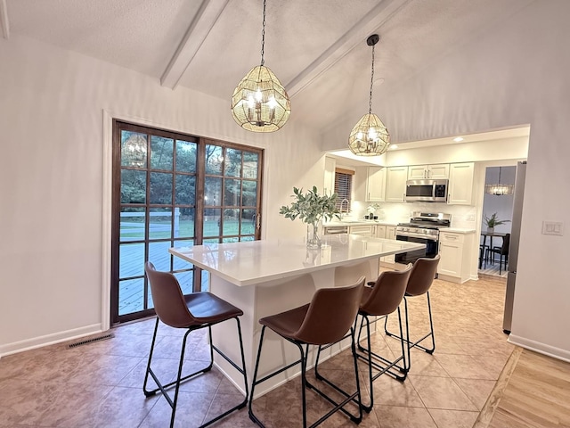 6412 Redbird Ln, Crystal Lake, IL 60012 - dining room with a chandelier, healthy amount of natural light, and a textured ceiling
