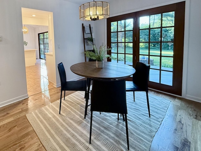 6412 Redbird Ln, Crystal Lake, IL 60012 - dining room with a chandelier and wood finished floors