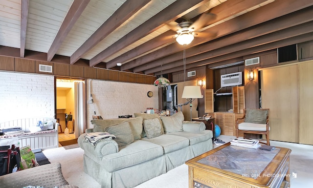 1247 Cavell Ave, Highland Park, IL 60035 - living area featuring beamed ceiling, ceiling fan, wooden walls, and a wall unit AC