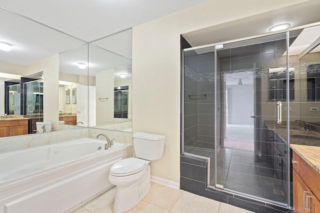 3100 Lexington Ln Unit 203, Glenview, IL 60026 - full bathroom with vanity, tile patterned flooring, a stall shower, and a garden tub