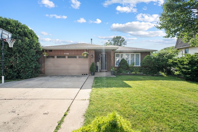 7726 S Moody Ave, Burbank, IL 60459 - view of front of property with brick siding, an attached garage, and driveway