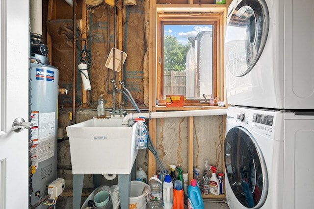 7726 S Moody Ave, Burbank, IL 60459 - washroom featuring stacked washer / dryer and gas water heater