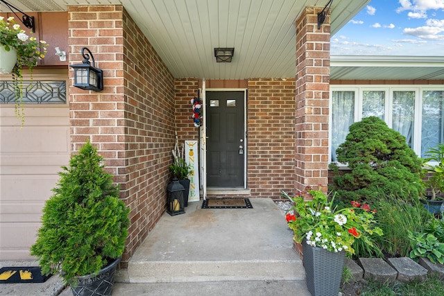 7726 S Moody Ave, Burbank, IL 60459 - entrance to property featuring covered porch and brick siding