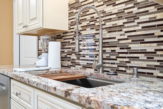 7726 S Moody Ave, Burbank, IL 60459 - kitchen with decorative backsplash, light stone counters, and white cabinets