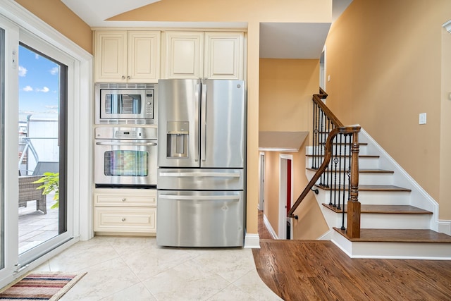 7726 S Moody Ave, Burbank, IL 60459 - kitchen featuring stainless steel appliances and cream cabinetry