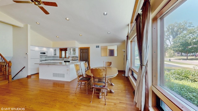 270 W Fremont Ave, Elmhurst, IL 60126 - dining space with lofted ceiling, plenty of natural light, recessed lighting, a ceiling fan, and light wood-style floors