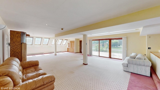270 W Fremont Ave, Elmhurst, IL 60126 - living area featuring light carpet, plenty of natural light, and a baseboard radiator