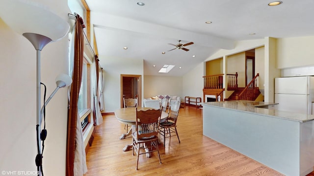 270 W Fremont Ave, Elmhurst, IL 60126 - dining space featuring light wood-style flooring, ceiling fan, vaulted ceiling, recessed lighting, and a skylight