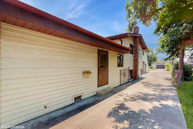270 W Fremont Ave, Elmhurst, IL 60126 - view of exterior entry featuring a chimney