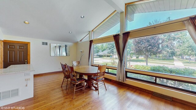 270 W Fremont Ave, Elmhurst, IL 60126 - dining area featuring wood finished floors, beam ceiling, recessed lighting, and high vaulted ceiling