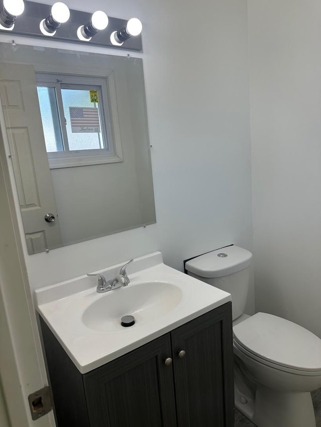 16341 Justine St, Markham, IL 60428 - bathroom with vanity and toilet