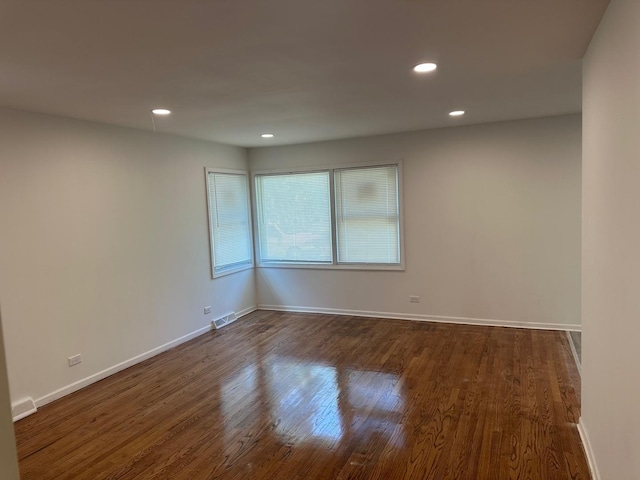 16341 Justine St, Markham, IL 60428 - unfurnished room with dark wood-type flooring and recessed lighting
