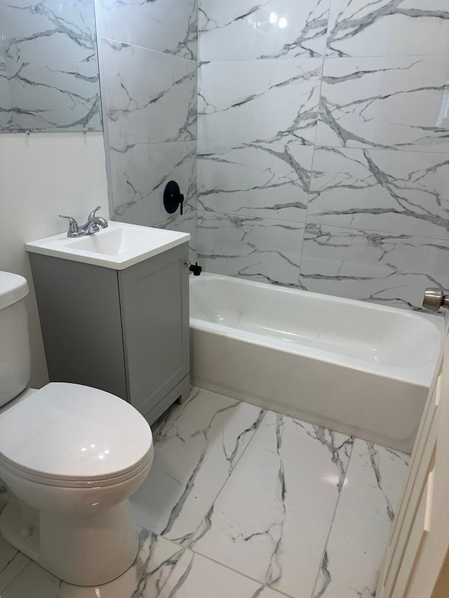 16341 Justine St, Markham, IL 60428 - full bathroom featuring marble look tile flooring, vanity, and shower / washtub combination