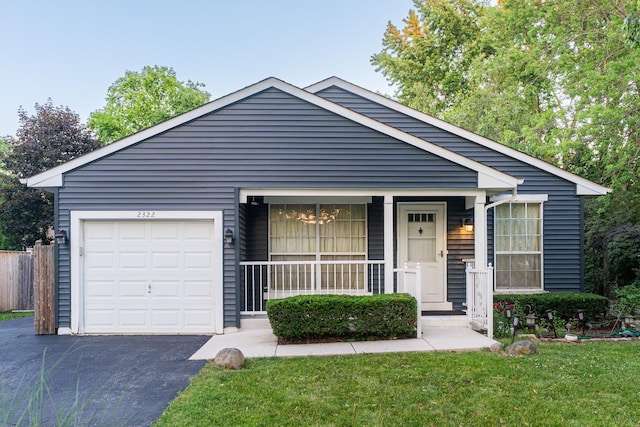 2322 Weatherford Ln, Naperville, IL 60565 - view of front facade with driveway, a front yard, an attached garage, and covered porch