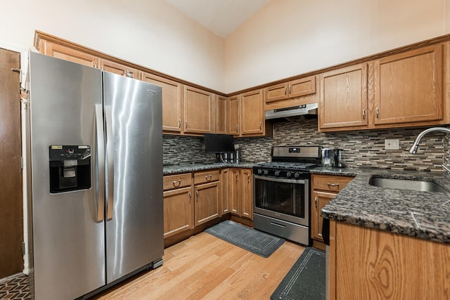 2322 Weatherford Ln, Naperville, IL 60565 - kitchen with stainless steel appliances, light wood-style floors, tasteful backsplash, and brown cabinets
