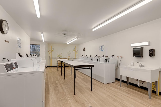 898 Wellington Ave Unit 218, Elk Grove Village, IL 60007 - community laundry featuring washing machine and dryer, a ceiling fan, and light wood-style floors