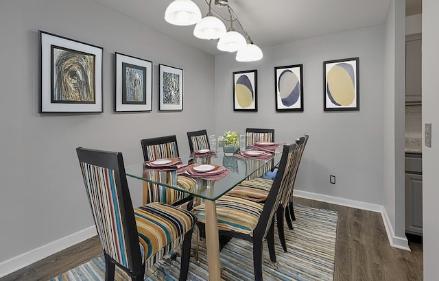 898 Wellington Ave Unit 218, Elk Grove Village, IL 60007 - dining room with dark wood finished floors and a chandelier