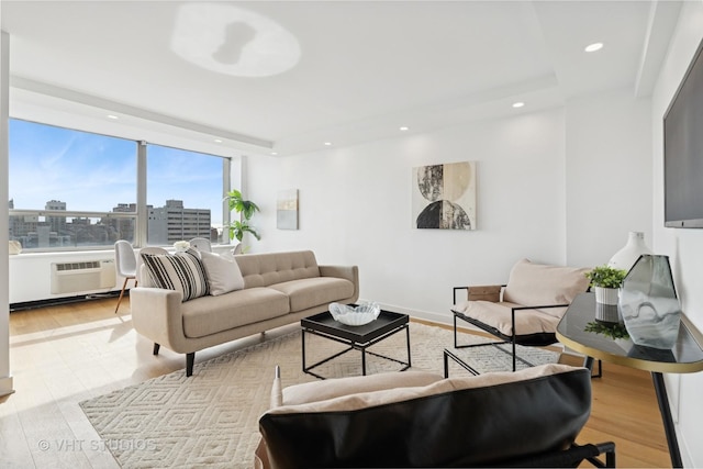 1455 N Sandburg Ter Unit 2606, Chicago, IL 60610 - living room with wood finished floors, recessed lighting, and a city view