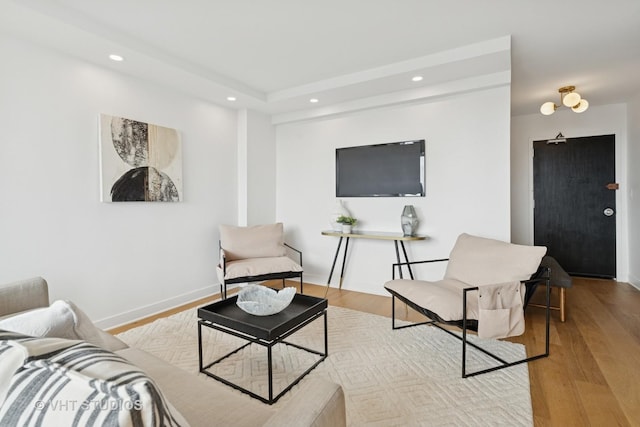 1455 N Sandburg Ter Unit 2606, Chicago, IL 60610 - living room featuring recessed lighting, wood finished floors, and a raised ceiling