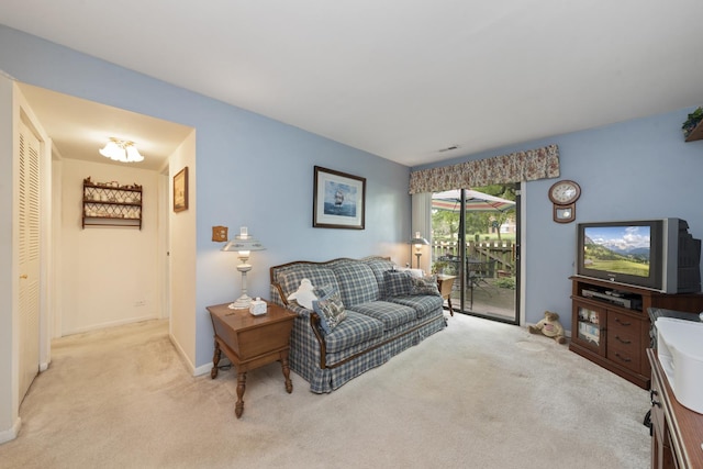 485 Raintree Ct Unit B, Glen Ellyn, IL 60137 - living room featuring carpet flooring and baseboards