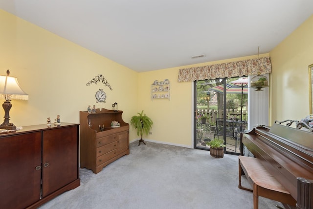485 Raintree Ct Unit B, Glen Ellyn, IL 60137 - living area featuring light colored carpet and baseboards