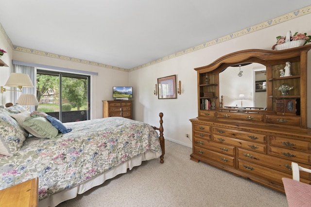 485 Raintree Ct Unit B, Glen Ellyn, IL 60137 - carpeted bedroom with access to outside and baseboards