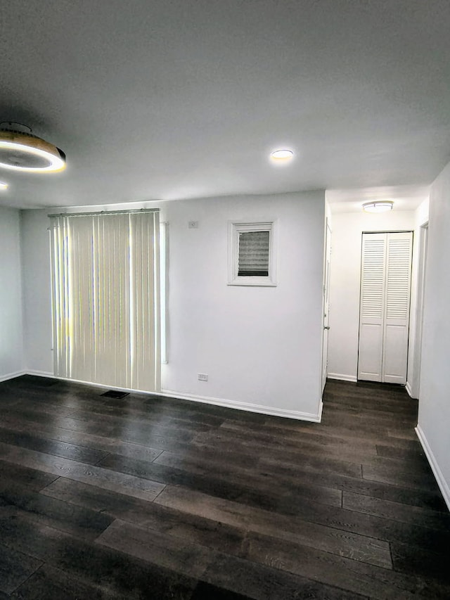 3206 W Lydia Ave, Robbins, IL 60472 - unfurnished room with dark wood-type flooring and recessed lighting