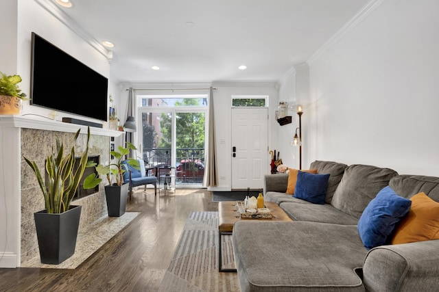 1428 W Lexington St Unit 1, Chicago, IL 60607 - living room featuring crown molding, wood finished floors, a tile fireplace, and recessed lighting