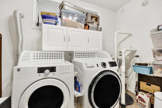 1428 W Lexington St Unit 1, Chicago, IL 60607 - laundry room with cabinet space and washer and clothes dryer